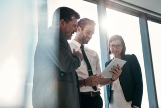 people looking at tablet